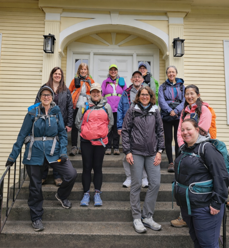 a digital photograph of ten hikers predominantly